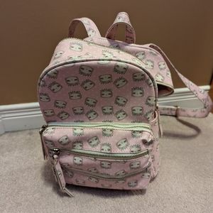 Small sloth backpack.  Sloth stuffie included.  Bought from chapters